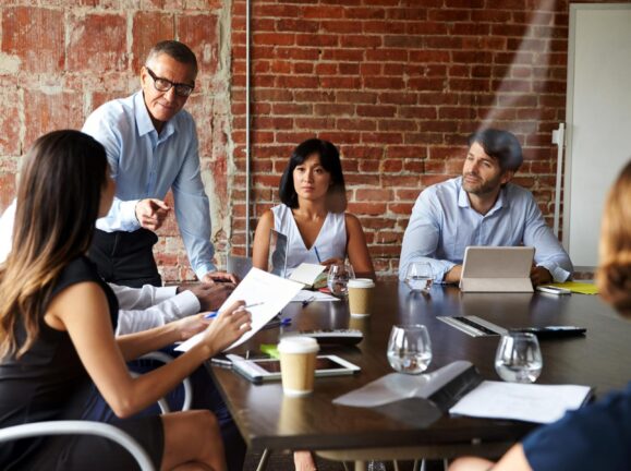 Team Meeting At Office